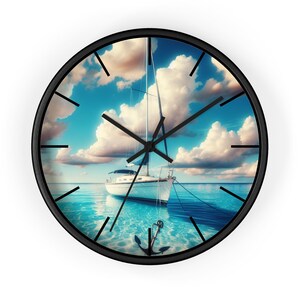 May include: A black framed wall clock with a blue sky, white clouds, and a sailboat on a turquoise ocean. The anchor is visible at the bottom of the clock.