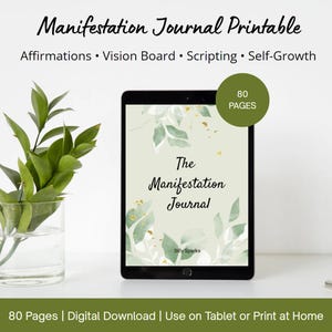 May include: A digital manifestation journal displayed on a tablet. The journal cover features a soft green background with leaf illustrations and the title "The Manifestation Journal." Additional text includes "Affirmations, Vision Board, Scripting, Self-Growth" and "80 Pages."