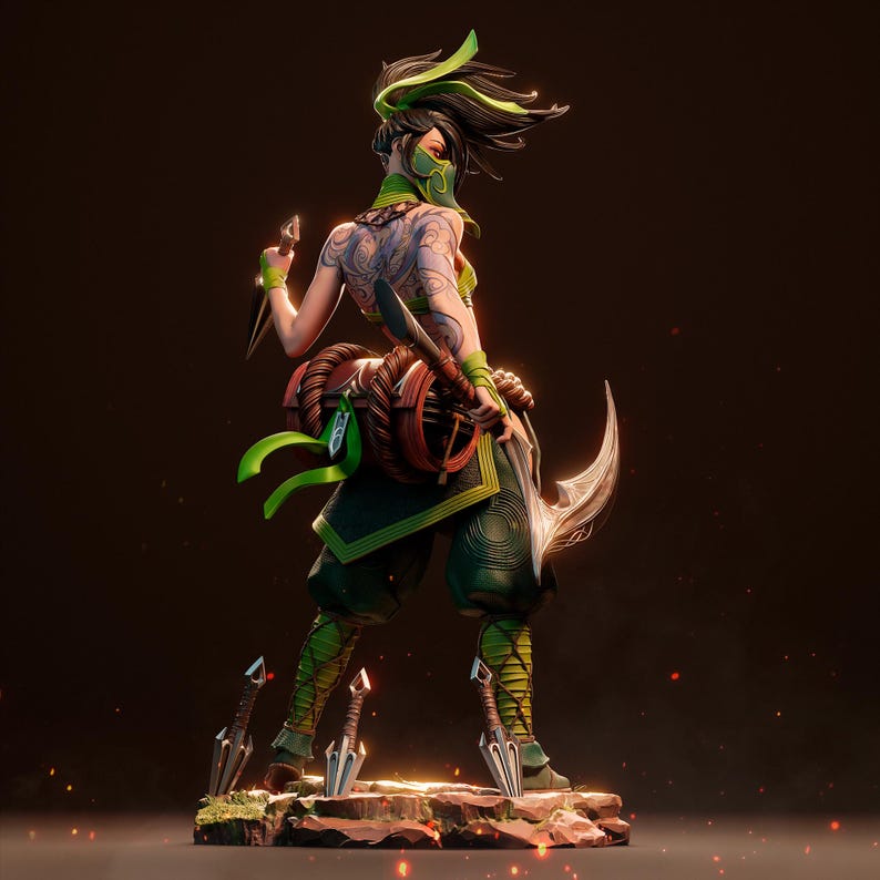 May include: A green and black action figure of a female character with a green mask, green hair, and a green and black outfit. She is holding a sword in her right hand and a dagger in her left hand. She is standing on a rocky base with a green and black background.