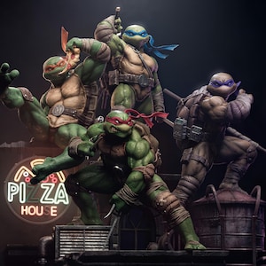 May include: Four Teenage Mutant Ninja Turtles action figures in a fighting pose. The figures are green, brown, and purple with red, blue, and purple bandanas. The figures are standing on a rooftop with a neon sign that says "Pizza House".
