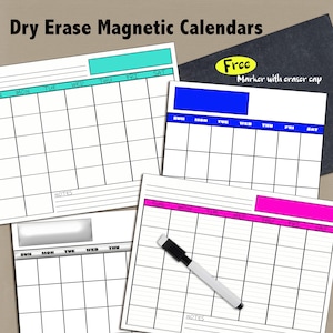 May include: White dry erase magnetic calendars with colorful headers. The calendars have a grid layout for daily planning, with space for notes. A free marker with an eraser cap is included. The text "Dry Erase Magnetic Calendars" is at the top.