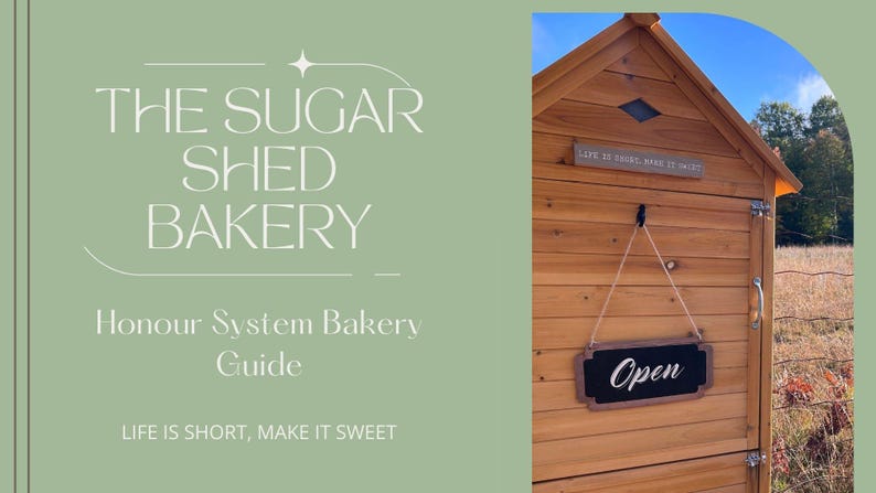 May include: A wooden shed with a sign that reads "The Sugar Shed Bakery" and "Life is short, make it sweet". The shed has a sign that says "Open" hanging from it.