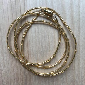 Hidden message morse code wrap bracelet, gold glass beads
