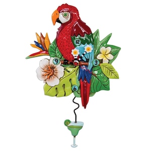 May include: A colourful parrot clock with a tropical design. The clock features a red and green parrot with a blue tail, surrounded by green leaves and flowers. The clock face is a circle with the numbers 1 through 12. The clock has a pendulum in the shape of a margarita glass.