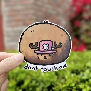reindeer sticker saying "don't touch me"