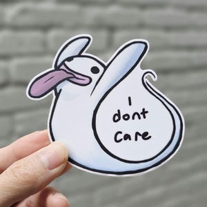 Ghost sticker labeled "i dont care"