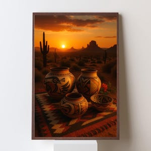 May include: A framed print featuring Southwestern pottery against a desert sunset backdrop. The pottery includes four pieces with intricate geometric and bird designs. The scene is set on a patterned rug with a cactus and mountain range in the background.