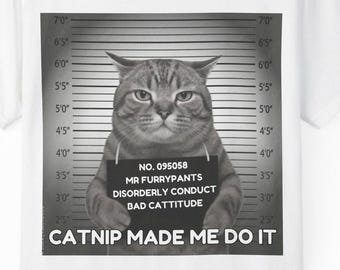 Catnip Made Me Do It T-Shirt | Funny Cat Mugshot Meme Tee | Guilty Cat Crimes Shirt | Comfortable Unisex Top for Everyday Apparel