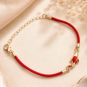 Red String Lucky Dolphin Bracelet – Gold Charm for Luck and Protection
