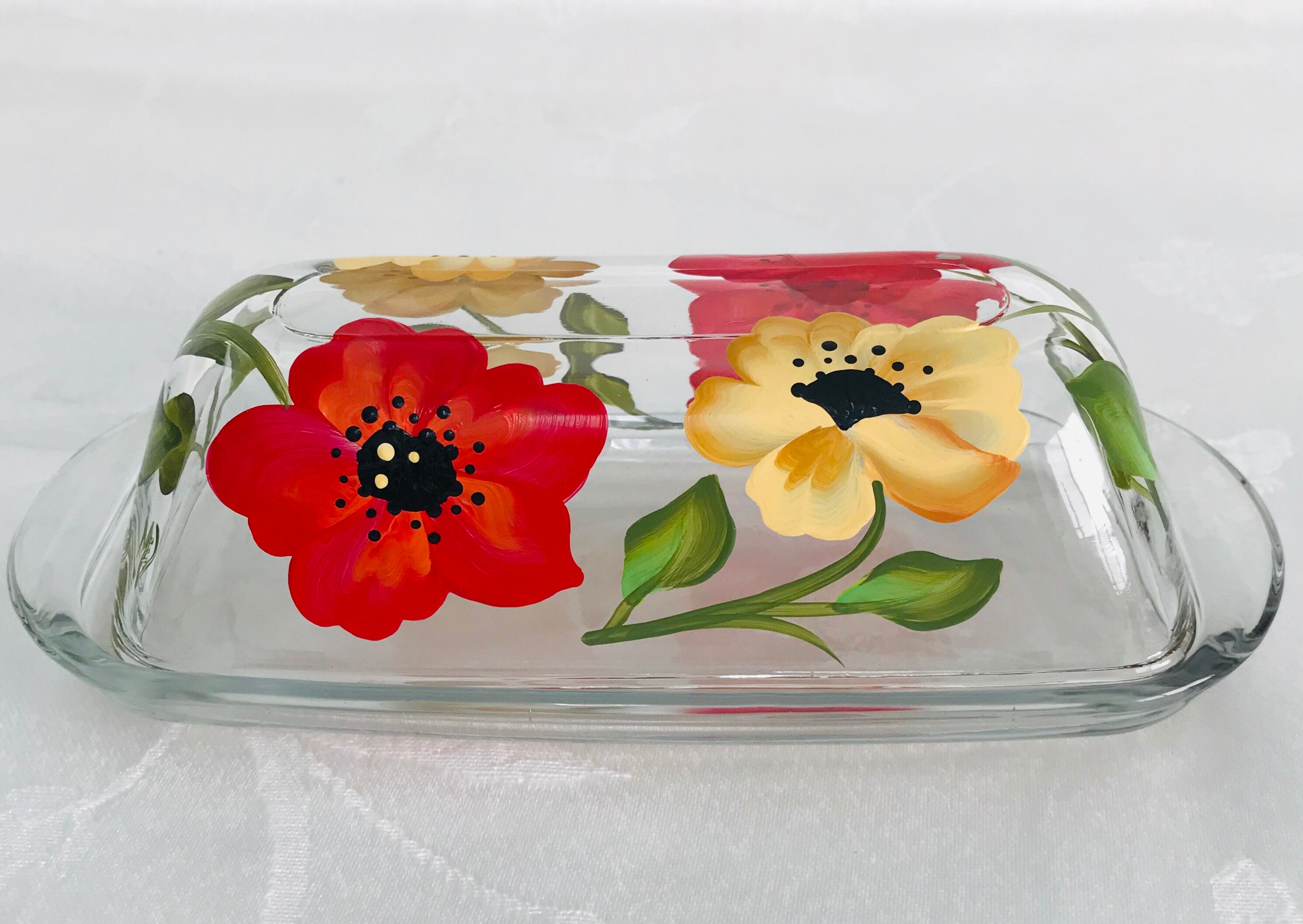 Handpainted red flower on a nice glass butterdish
