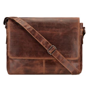 May include: A brown leather messenger bag with a flap closure and adjustable shoulder strap. The bag has a rectangular shape with visible stitching and a metal buckle. The leather has a distressed appearance.