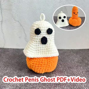 May include: A handmade crochet ghost with a white body and orange base. The ghost has three black button eyes and a black mouth. The image also includes two smaller crochet figures. The text at the bottom reads "Crochet Penis Ghost PDF+Video".