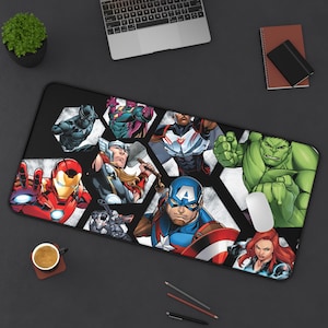 May include: A set of three ceramic mugs with a speckled, matte finish. The mugs are in shades of cream, light gray, and dark gray. Each mug has a simple, minimalist design and a rounded handle.