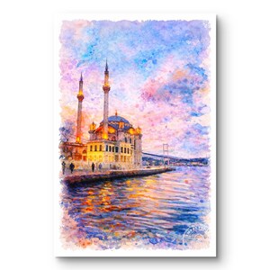May include: Watercolor print of a mosque with two minarets, a dome, and a bridge in the background. The artwork features a colorful sky with shades of blue, pink, and orange, and the water reflects the lights.