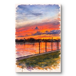 May include: Watercolor painting of a sunset over a body of water. The sky is a mix of orange, red, and blue hues. The water reflects the colors of the sky. A dock and grassy area are in the foreground.