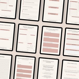 May include: Multiple digital tablets displaying planner pages with text and pink accents. The screens show sections for monthly vision, reflection, goals, and productivity. The tablets are arranged on a light-colored surface.
