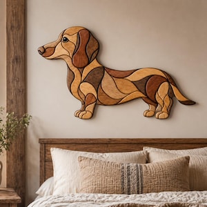 May include: A wall-mounted decorative art piece shaped like a dachshund, constructed from multiple interlocking segments of wood in varying shades of brown, tan, and cream, featuring a smooth finish and a stylized, segmented design.