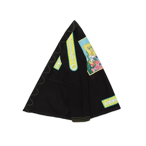 May include: Black martial arts gi with yellow stitching and cartoon character patches. The gi features the word "ALBINO" on a patch and "SQUARREDANTS" on another.