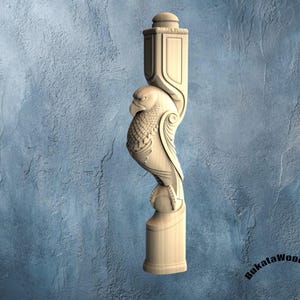 May include: A light-colored wooden furniture leg featuring a detailed hand-carved eagle design. The vertical post includes a rounded top, a central eagle figure with textured plumage, and a cylindrical base. The text BukataWoodwork is visible.