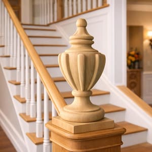 May include: A white ceramic mug with a black handle and the text "But First, Coffee" in a bold, black font. The mug is set against a blurred background, highlighting its clean design.
