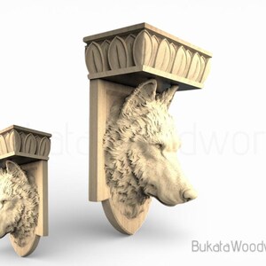 May include: Wooden wall-mounted shelf with a carved wolf head. The shelf has a decorative top with a leaf design. The wolf head is intricately detailed, with a textured fur appearance. The shelf is made of light-coloured wood.