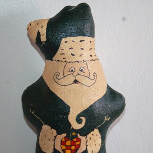 Vtg Father Christmas in a Green Fur Trimmed Robe & Hat Holding a Red and Yellow Checkered Heart Primitive Oil Cloth Doll signed K.H. '94