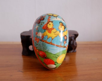 German Paper Mache Easter Egg w/ a Cute Girl & Boy Chicks on a Swing on a Beautiful Spring Day, surrounded by Butterflies, Flowers and Eggs