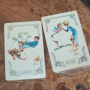 Two NIP Factory Sealed Norman Rockwell Children Playing Pictured Spring & Summer Scenes Standand Playing Cards ~ Trump Brand ~ USA Made