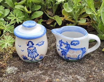 Azucarero y jarra para crema vintage de M A Hadley, American Pottery, con diseño de la esposa del granjero y una vaca ~ Excelente estado