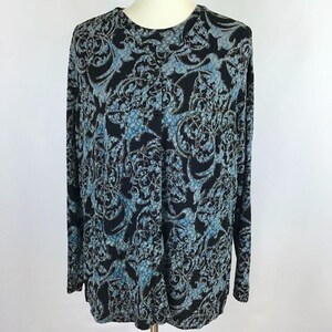 May include: A long-sleeved shirt with a black background and a blue and gold paisley pattern.