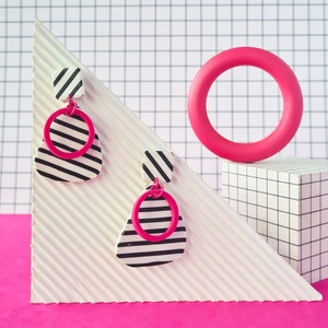 hot pink fushia and black & white striped handmade polymer earrings. 80s neo memphis earring, minimal, Bauhaus, funky colourful rebel dangle