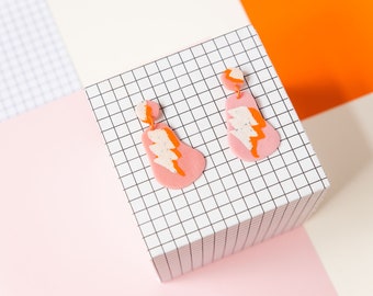 pink, white and orange handmade polymer clay earrings with lightning bolt pattern. 80s earrings, minimal, memphis, funky statement dangles