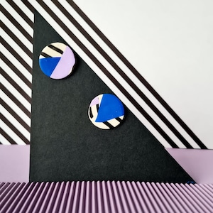 Blue and violet striped color block stud earrings. Handmade polymer clay statement studs. 80s memphis group, minimal, bauhaus, funky
