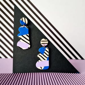 Blue and violet striped color block earrings. Handmade polymer clay statement dangles. 80s memphis group, minimal, bauhaus, funky