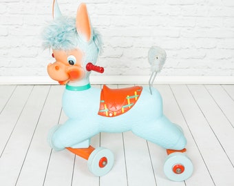 Raro burro Canova vtg de los años 60 sobre ruedas. Coleccionable italiano vintage retro de mediados de siglo. caucho y plástico azul caballo rodante niño pequeño