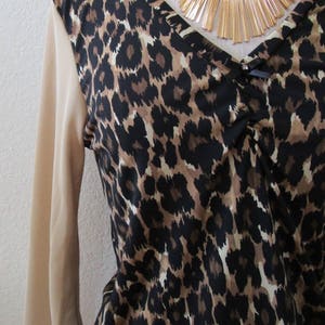 Leopard pattern print with brown, black and cream color and oatmeal color for the sleeves top plus made in USA v131 image 4