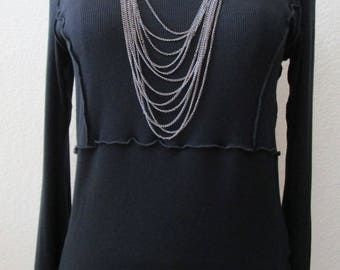 Black color top with acrylic decoration beads decoration and ruffled edging plus made in USA (V127)