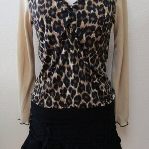 Leopard pattern print with brown, black and cream color and oatmeal color for the sleeves top plus made in USA v131 image 1