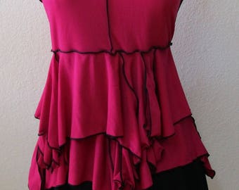 Fuschia color sleeve less top with 1 rose decoration and black stitching plus made in USA product. (vn42)