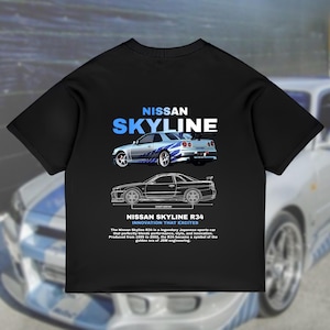 May include: Black t-shirt with a white outline of a silver Nissan Skyline R34 car. The text "NISSAN SKYLINE" is in blue and white above the car. The text "NISSAN SKYLINE R34 INNOVATION THAT EXCITES" is below the car. The text below the car reads: "The Nissan Skyline R34 is a legendary Japanese sports car that perfectly blends performance, style, and innovation. Produced from 1999 to 2002, the R34 became a symbol of the golden era of JDM engineering."