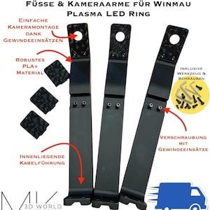 Może przedstawiać: Czarny zestaw ramienia i stopy kamery do Winmau Plasma LED Ring. Zestaw zawiera trzy czarne ramiona, trzy czarne kwadratowe elementy oraz zestaw narzędzi i śrub. Ramiona mają otwór u góry i podstawę u dołu.