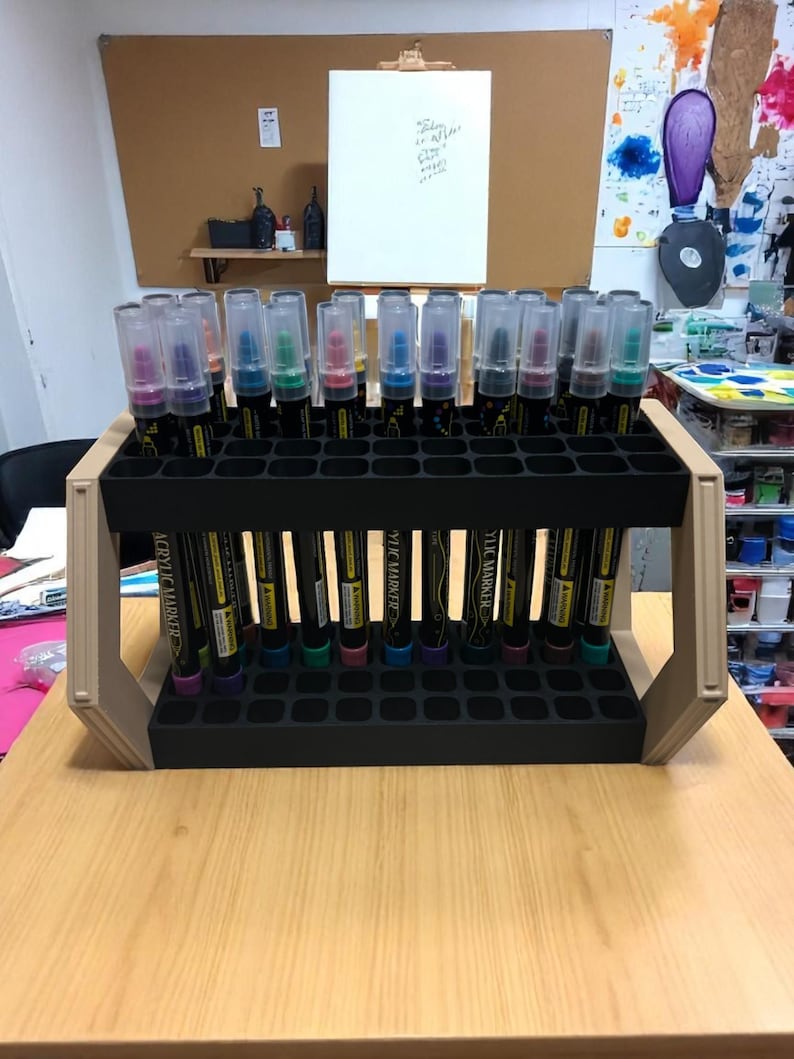 "Hex-sided pen holder showing angled display mode with markers inserted"