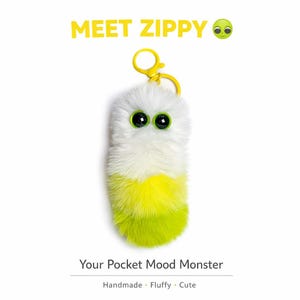 May include: A plush, white, and yellow pocket mood monster keychain with large black eyes and a yellow clip. The text "MEET ZIPPY" is above the monster, and "Your Pocket Mood Monster" is below.