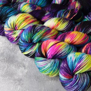 Merino 4 ply/ sock/ fingering superwash wool hand dyed knitting yarn 100g - 'Shinjuku' neon, black, turquoise, purple, pink variegated