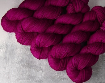 Merino 4 ply/ fingering/ sock weight hand dyed 100% wool superwash knitting yarn 100g in ‘Professor Plum’ (magenta purple) ethically sourced