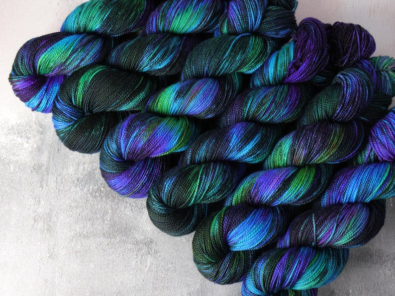 Merino 4 ply/fingering/sock weight wool superwash hand dyed knitting yarn 100g 'Outer Planets' black, neon purple, green, turquoise image 1