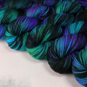 DK British Bluefaced Leicester wool superwash hand-dyed yarn 100g - 'Outer Planets' (mottled black, purple, turquoise, green, neon)