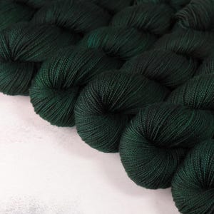 Merino 4 ply/ sock/ fingering weight 100% wool superwash hand-dyed knitting yarn 100g - ‘Monstera’ (semi-solid deep dark green)