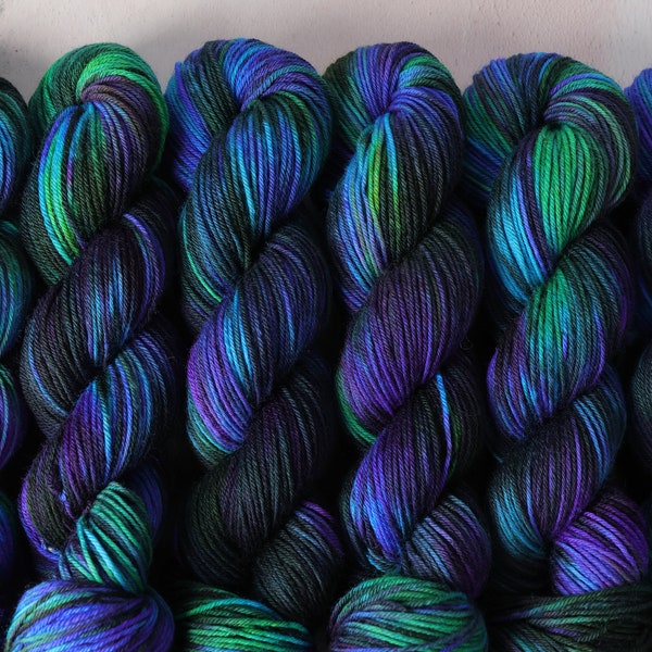 DK British Bluefaced Leicester wool superwash hand-dyed knitting yarn 100g - 'Outer Planets' (mottled black, purple, turquoise, green, neon)