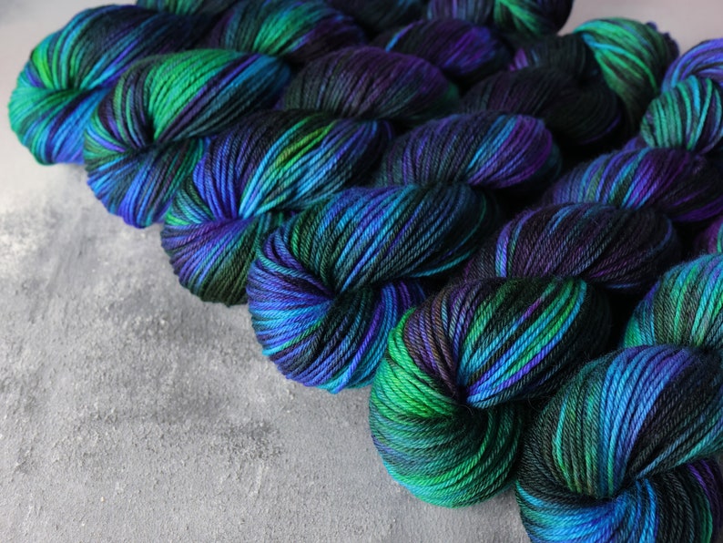 DK British Bluefaced Leicester wool superwash hand-dyed knitting yarn 100g 'Outer Planets' mottled black, purple, turquoise, green, neon image 2